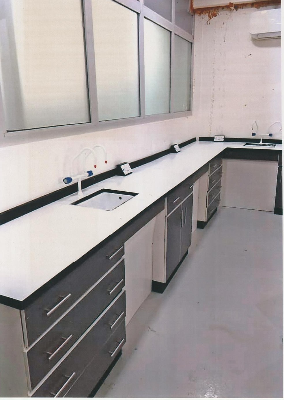 Extended sink bench with under-bench cabinetry