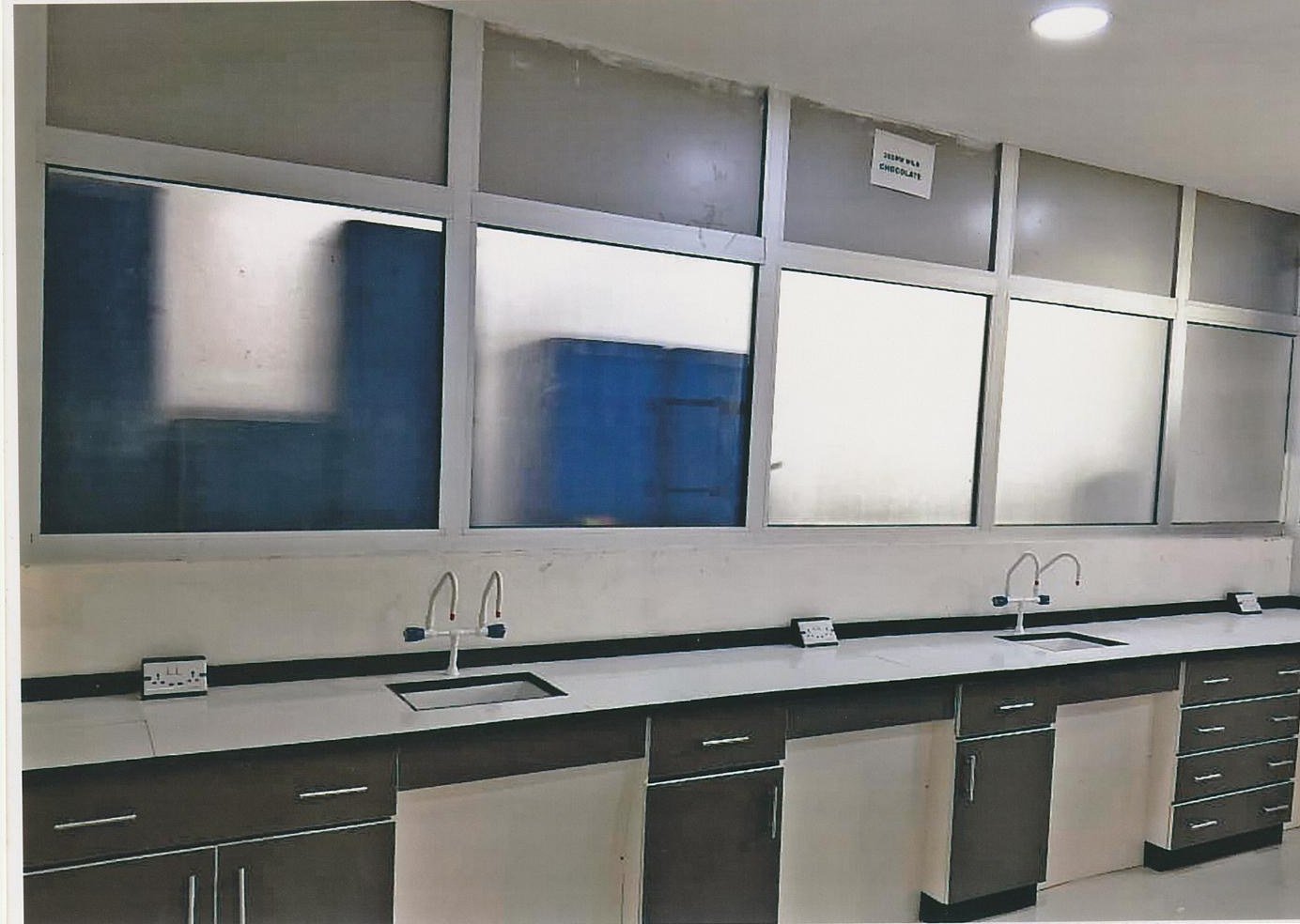 L-shaped bench with integrated sink and storage